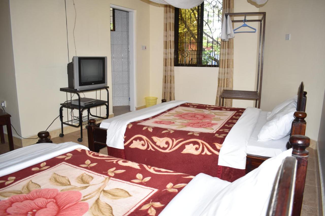 Rainbow Executive Lodge Boma la Ngombe Buitenkant foto