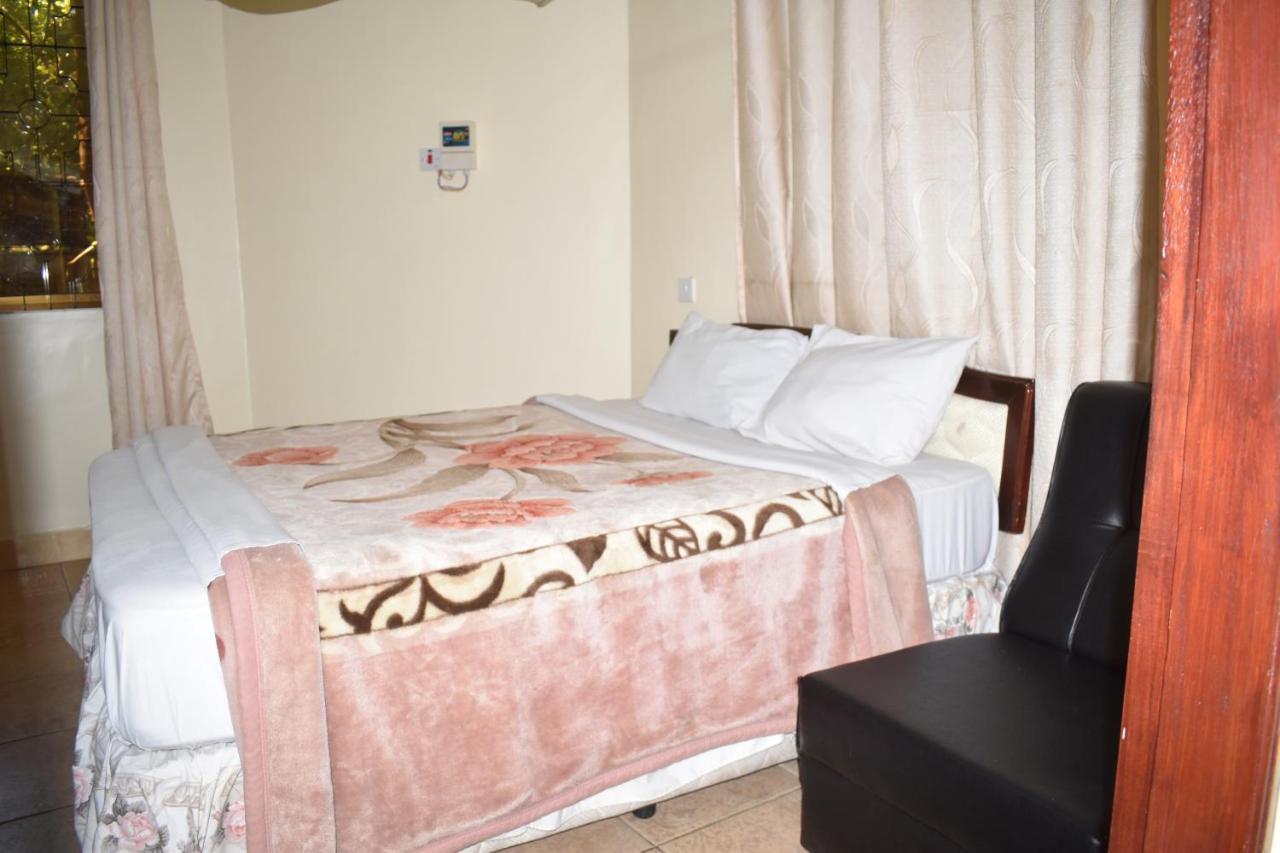 Rainbow Executive Lodge Boma la Ngombe Buitenkant foto