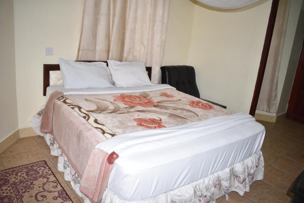 Rainbow Executive Lodge Boma la Ngombe Buitenkant foto